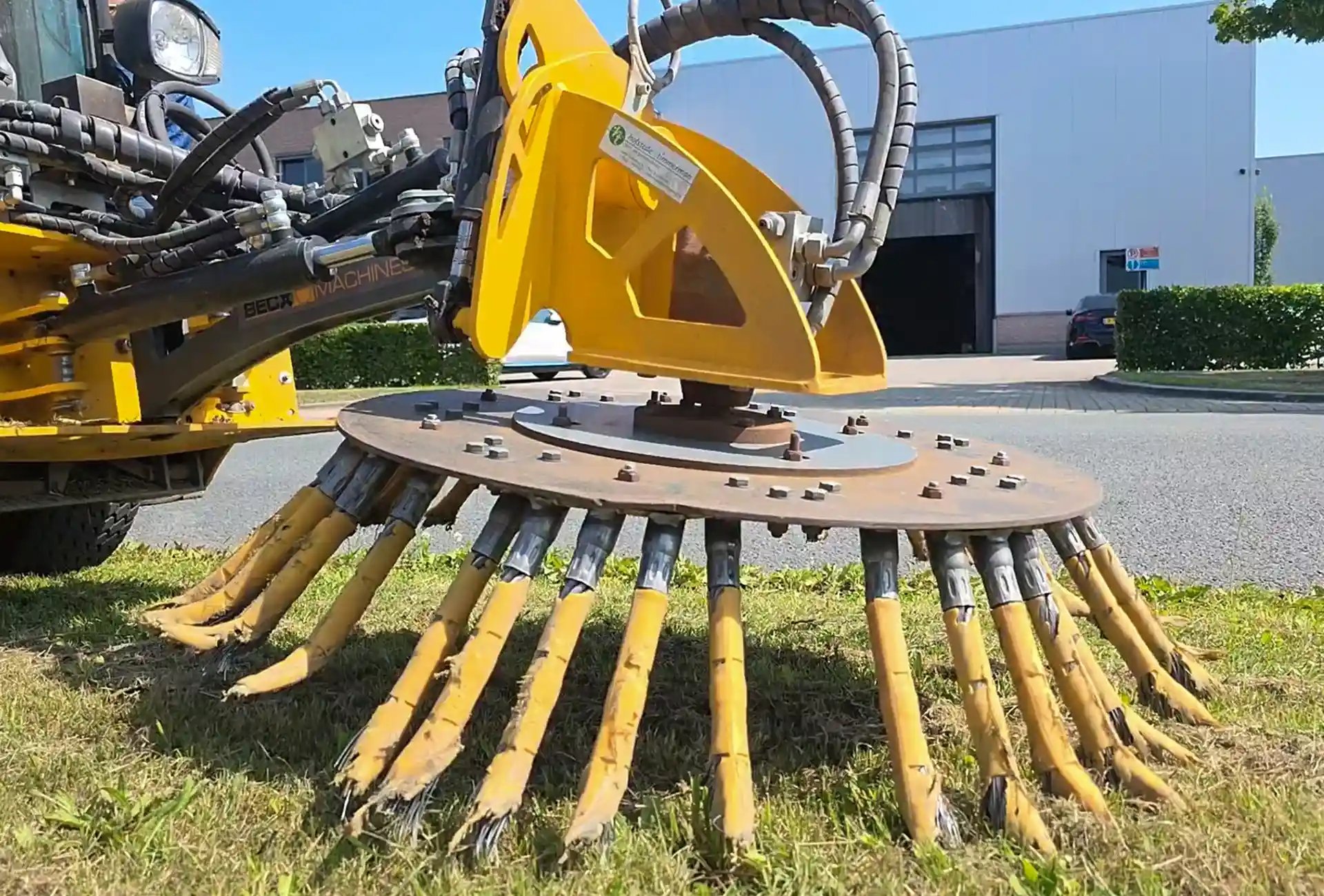 Mechanical sweeper attachement