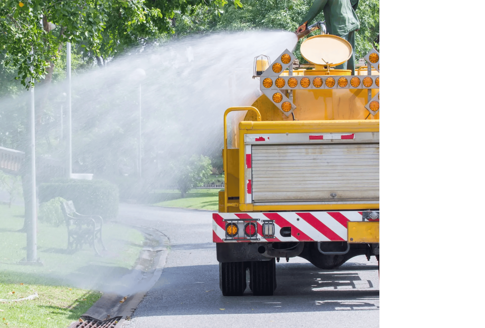 Watering truck watering trees