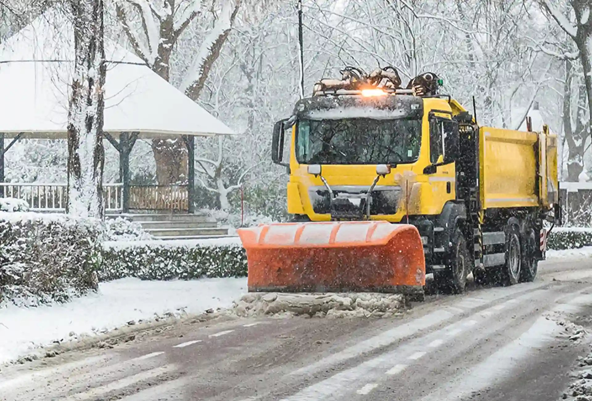Snow plough working on clearing roads of snow
