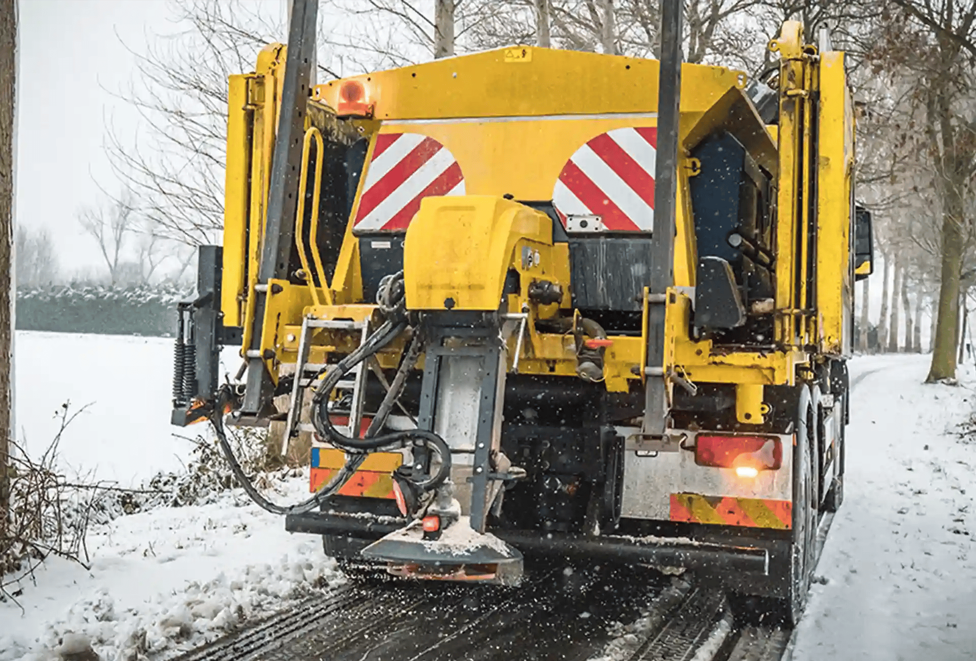 Spreader working on de-icing roads